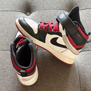 Kids Nike Air Jordan Black and Red Hi Top Sneakers